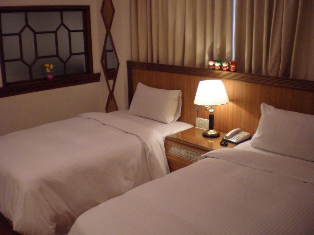 Emperor Hotel Cao Hùng Phòng bức ảnh